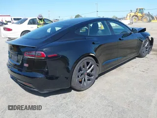 2022 Tesla Model S Plaid with VIN 5YJSA1E61NF483354, listed as a IAAI auction lot 41973636 with 32,541 mi miles and . Bid and sale history available at DreamBid. Image 4.