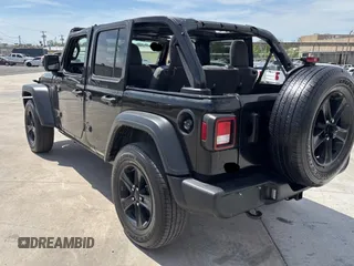 2023 Jeep Wrangler Sport S with VIN 1C4HJXDG2PW615754, listed as a Copart auction lot 53884255 with 34,427 mi miles and Clean Title. Bid and sale history available at DreamBid. Image 3.