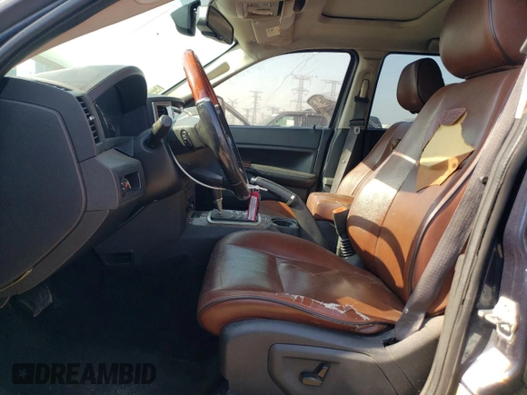 2009 Jeep Grand Cherokee with VIN 1J8HR68T19C535580, listed as a Copart auction lot 57119855 with 208,078 mi miles and Clean title. Bid and sale history available at DreamBid. Image 7.