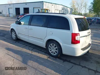 2013 Chrysler Town & Country Touring with VIN 2C4RC1BG6DR540964, listed as a IAAI auction lot 42215779 with 218,141 mi miles and . Bid and sale history available at DreamBid. Image 3.
