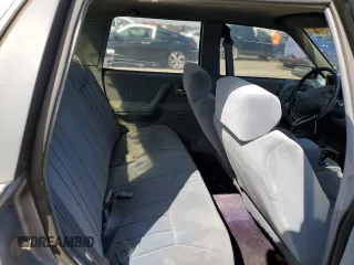 1996 Oldsmobile Cutlass Ciera 1SA VX5 z VIN 1G3AJ55M3T6326130, wystawiony jako Copart lot #73877264 z przebiegiem 74 073 mil mil oraz Szkody całkowita. Historia ofert i sprzedaży dostępna na DreamBid. Obrazek 10.