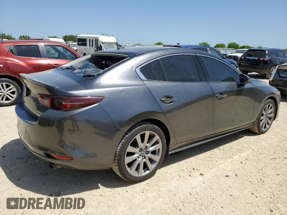 2021 Mazda 3 Premium with VIN JM1BPADL9M1319945, listed as a Copart auction lot 52902425 with 74,221 mi miles and Salvage title. Bid and sale history available at DreamBid. Image 3.