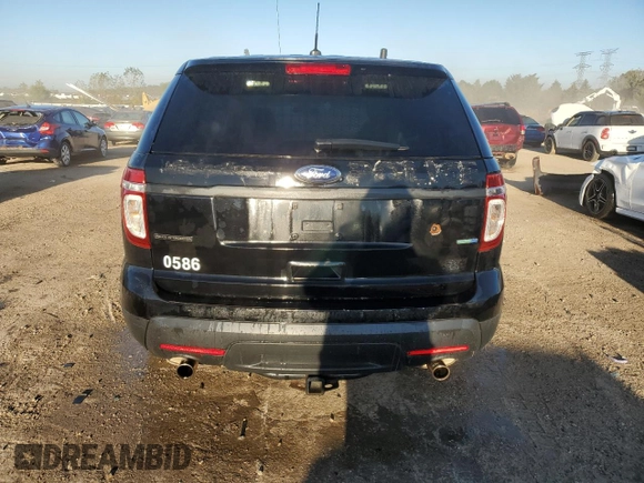 2014 Ford Utility Police Interceptor with VIN 1FM5K8AR7EGC26025, listed as a Copart auction lot 73310774 with 122,681 mi miles and Salvage Title. Bid and sale history available at carsss.com. Image 6.