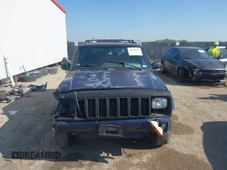 2001 Jeep Cherokee Sport with VIN 1J4FT48S01L522281, listed as a IAAI auction lot 41999570 with 261,698 mi miles and . Bid and sale history available at DreamBid. Image 12.