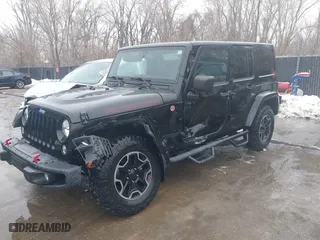 2015 Jeep Wrangler Unlimited Rubicon Hard Rock with VIN 1C4HJWFG9FL569962, listed as a IAAI auction lot 41557801 with 78,597 mi miles. Bid and sale history available at carsss.com. Image 17.