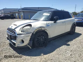 2015 MINI Hardtop 4 Door S with VIN WMWXU3C53F2B57000, listed as a Copart auction lot 61408475 with 135,422 mi miles and Salvage title. Bid and sale history available at DreamBid. Image 1.