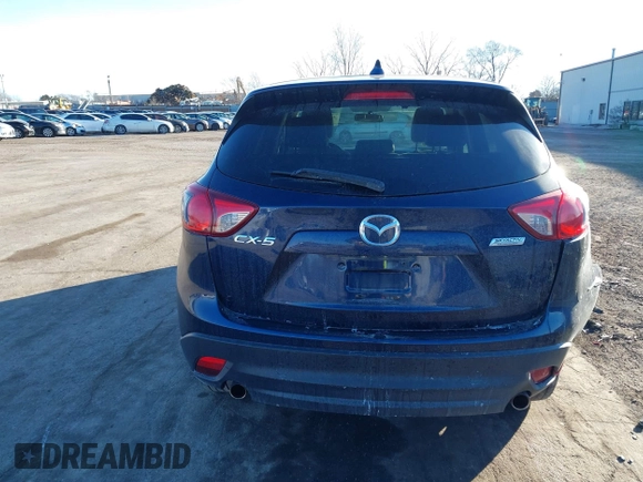 2014 Mazda CX-5 Touring with VIN JM3KE2CY8E0375009, listed as a IAAI auction lot 41420045 with 138,404 mi miles. Bid and sale history available at carsss.com. Image 16.