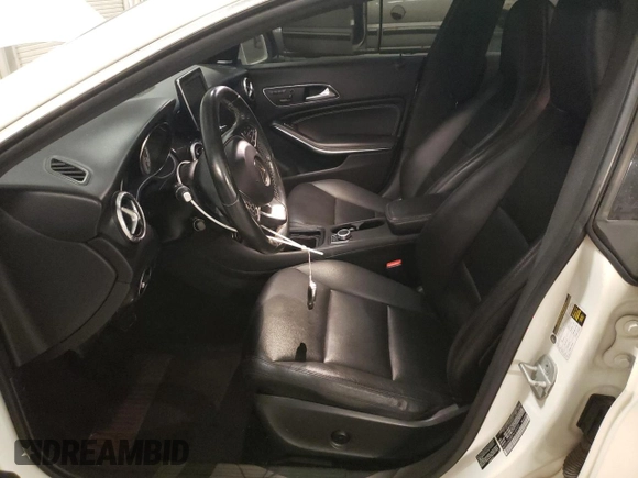 2015 Mercedes-Benz CLA 250 with VIN WDDSJ4GB5FN189122, listed as a Copart auction lot 57647115 with 118,038 mi miles and Salvage title. Bid and sale history available at DreamBid. Image 7.
