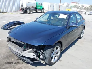 2012 BMW 3 Series 328i with VIN WBA3C1C58CA696975, listed as a IAAI auction lot 42507653 with 136,036 mi miles and . Bid and sale history available at DreamBid. Image 2.