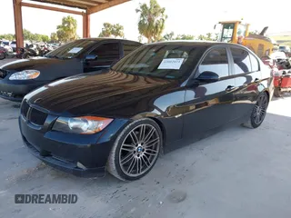 2008 BMW 3 Series 328i with VIN WBAVA37598NL45805, listed as a IAAI auction lot 42002424 with 206,402 mi miles. Bid and sale history available at carsss.com. Image 2.
