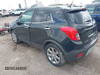 2014 Buick Encore Leather with VIN KL4CJCSB2EB751665, listed as a IAAI auction lot 41972107 with 94,177 mi miles and . Bid and sale history available at carsss.com. Image 3.
