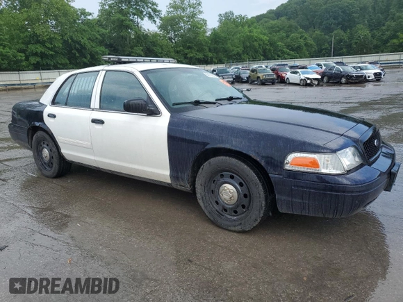 2011 Ford Police Interceptor with VIN 2FABP7BV8BX160188, listed as a Copart auction lot 59710915 with 142,316 mi miles and Salvage title. Bid and sale history available at DreamBid. Image 4.