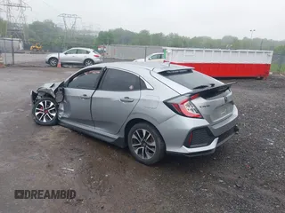 2018 Honda Civic EX with VIN SHHFK7H54JU428670, listed as a IAAI auction lot 42264429 with 74,759 mi miles and . Bid and sale history available at DreamBid. Image 3.