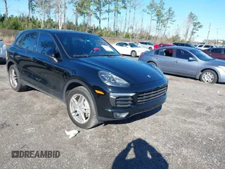 2016 Porsche Cayenne with VIN WP1AA2A21GLA02456, listed as a IAAI auction lot 41309026 with 136,266 mi miles. Bid and sale history available at carsss.com. Image 1.