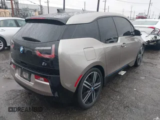 2014 BMW i3 with VIN WBY1Z4C58EV276329, listed as a IAAI auction lot 41570602 with 87,925 mi miles and . Bid and sale history available at DreamBid. Image 4.