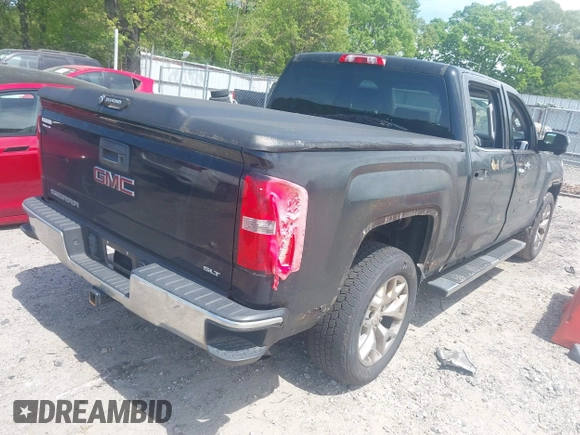 2015 GMC Sierra 1500 SLT with VIN 3GTU2VEC5FG200727, listed as a IAAI auction lot 42017160 with 191,201 mi miles and . Bid and sale history available at DreamBid. Image 4.