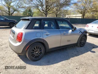 2019 MINI Hardtop 4 Door Cooper with VIN WMWXU1C52K2J02579, listed as a Copart auction lot 53507295 with 94,350 mi miles and Salvage Title. Bid and sale history available at DreamBid. Image 3.