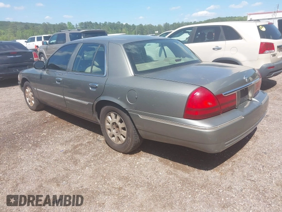 2003 Mercury Grand Marquis LS Premium z VIN 2MEFM75W53X691700, wystawiony jako IAAI lot #41952048 z przebiegiem 208 747 mil mil oraz . Historia ofert i sprzedaży dostępna na DreamBid. Obrazek 3.