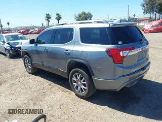 2021 GMC Acadia SLT with VIN 1GKKNMLS1MZ218856, listed as a IAAI auction lot 41797665 with 59,958 mi miles. Bid and sale history available at carsss.com. Image 3.