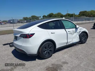 2025 Tesla Model Y Long Range with VIN 7SAYGDED6SF234278, listed as a IAAI auction lot 41781695 with 1,168 mi miles and . Bid and sale history available at DreamBid. Image 4.