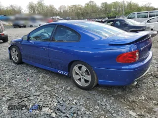 2005 Pontiac GTO z VIN 6G2VX12U55L432796, wystawiony jako Copart lot #53055995 z przebiegiem 147 253 mil mil oraz Szkody całkowita. Historia ofert i sprzedaży dostępna na DreamBid. Obrazek 2.