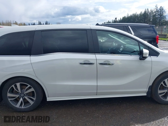 2021 Honda Odyssey Touring with VIN 5FNRL6H87MB015310, listed as a IAAI auction lot 41916339 with 58,808 mi miles. Bid and sale history available at carsss.com. Image 14.