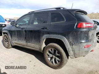 2016 Jeep Cherokee Trailhawk with VIN 1C4PJMBSXGW131199, listed as a Copart auction lot 49292505 with 97,359 mi miles and Salvage Title. Bid and sale history available at DreamBid. Image 2.
