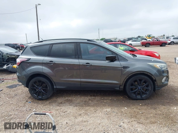 2017 Ford Escape SE with VIN 1FMCU0G99HUC65571, listed as a IAAI auction lot 41923517 with 77,179 mi miles and . Bid and sale history available at DreamBid. Image 13.