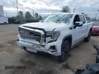 2020 GMC Sierra 1500 Denali z VIN 3GTU9FELXLG371258, wystawiony jako IAAI lot #41303490 z przebiegiem 63 571 mil mil oraz . Historia ofert i sprzedaży dostępna na DreamBid. Obrazek 19.