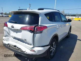 2017 Toyota RAV4 LE with VIN JTMBFREV9HJ147391, listed as a IAAI auction lot 41993617 with 90,666 mi miles. Bid and sale history available at carsss.com. Image 4.