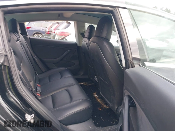 2018 Tesla Model 3 Long Range Battery z VIN 5YJ3E1EB3JF127410, wystawiony jako IAAI lot #41994858 z przebiegiem 100 494 mil mil oraz . Historia ofert i sprzedaży dostępna na DreamBid. Obrazek 8.