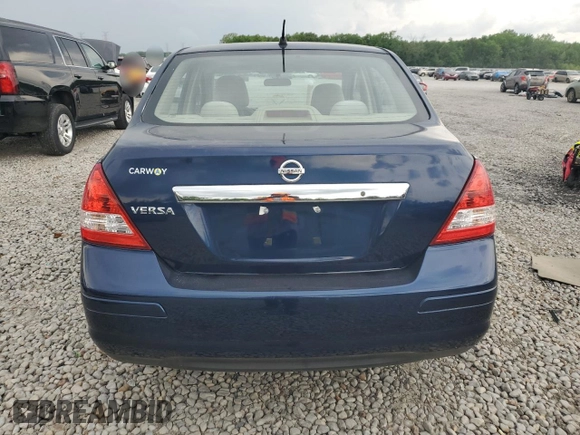2009 Nissan Versa S with VIN 3N1BC11E19L433572, listed as a Copart auction lot 54084215 with 144,178 mi miles and Salvage title. Bid and sale history available at DreamBid. Image 6.