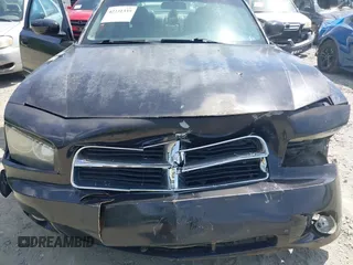 2006 Dodge Charger R/T z VIN 2B3KA53H16H507595, wystawiony jako IAAI lot #42231335 z przebiegiem 230 658 mil mil oraz . Historia ofert i sprzedaży dostępna na DreamBid. Obrazek 10.