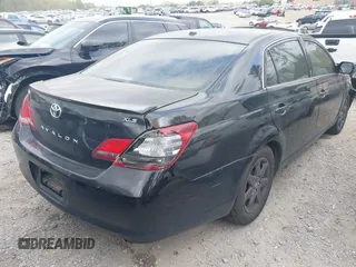 2010 Toyota Avalon XL with VIN 4T1BK3DB8AU358260, listed as a IAAI auction lot 41942640 with 230,584 mi miles and . Bid and sale history available at carsss.com. Image 4.