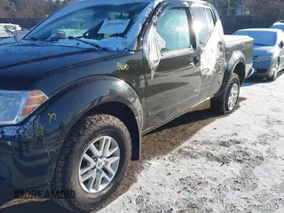 2018 Nissan Frontier SV with VIN 1N6AD0EV0JN718047, listed as a IAAI auction lot 41310302 with 103,488 mi miles and . Bid and sale history available at DreamBid. Image 6.