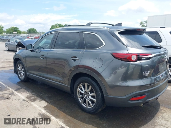 2019 Mazda CX-9 Touring with VIN JM3TCACY6K0334085, listed as a IAAI auction lot 42391595 with 113,723 mi miles and . Bid and sale history available at DreamBid. Image 14.