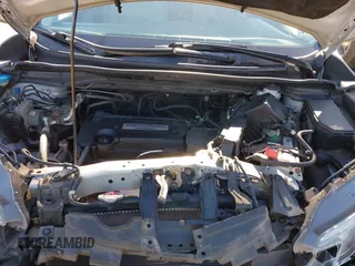 2015 Honda CR-V EX with VIN 2HKRM4H58FH679739, listed as a IAAI auction lot 41395029 with 153,776 mi miles and . Bid and sale history available at DreamBid. Image 10.