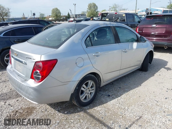 2015 Chevrolet Sonic LT with VIN 1G1JC5SH6F4121976, listed as a IAAI auction lot 42143052 with 63,885 mi miles and . Bid and sale history available at DreamBid. Image 4.