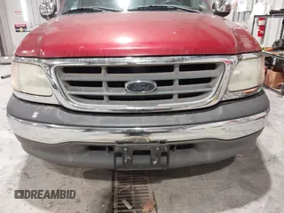 2002 Ford F-150 XL with VIN 1FTRX17L12NA36715, listed as a IAAI auction lot 41850555 with 174,012 mi miles. Bid and sale history available at carsss.com. Image 6.
