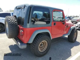 1999 Jeep Wrangler Sport with VIN 1J4FY19S7XP401120, listed as a Copart auction lot 64233665 with 129,708 mi miles and Salvage title. Bid and sale history available at DreamBid. Image 3.