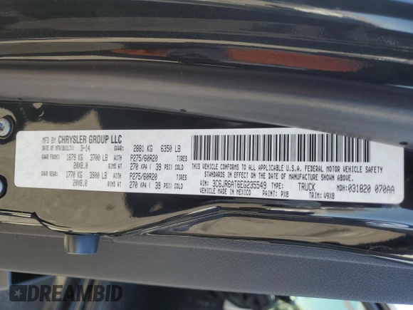 2014 Ram 1500 Express with VIN 3C6JR6AT6EG235549, listed as a Copart auction lot 52744925 with 123,996 mi miles and Salvage title. Bid and sale history available at DreamBid. Image 13.