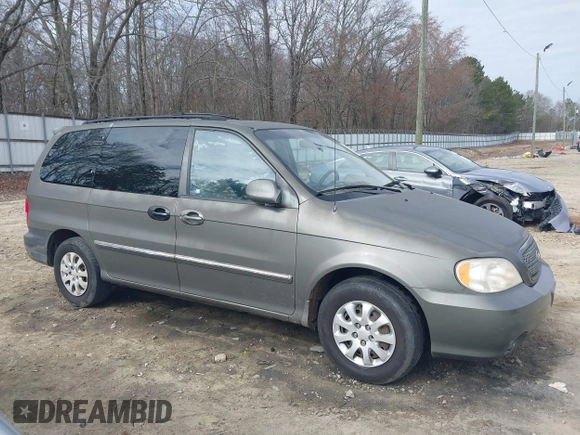 2004 Kia Sedona LX with VIN KNDUP131546543841, listed as a IAAI auction lot 41541012 with 112,122 mi miles. Bid and sale history available at carsss.com. Image 13.