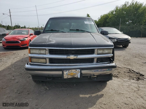 1999 Chevrolet Tahoe Z71 with VIN 1GNEK13R6XJ411348, listed as a Copart auction lot 71179204 with 162,752 mi miles and Salvage Title. Bid and sale history available at carsss.com. Image 5.