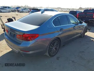 2019 BMW 5 Series 530e iPerformance with VIN WBAJA9C51KB391855, listed as a IAAI auction lot 41429622 with 47,162 mi miles. Bid and sale history available at carsss.com. Image 4.