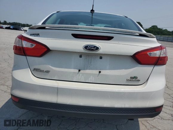 2012 Ford Focus SE z VIN 1FAHP3F24CL427067, wystawiony jako Copart lot #60402005 z przebiegiem 141 810 mil mil oraz Czysty tytuł • Clean title. Historia ofert i sprzedaży dostępna na DreamBid. Obrazek 6.