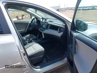 2014 Toyota RAV4 LE with VIN 2T3BFREV4EW136537, listed as a IAAI auction lot 42065728 with 211,039 mi miles and . Bid and sale history available at DreamBid. Image 5.