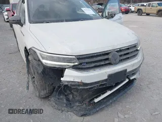 2022 Volkswagen Tiguan SE R-Line Black с VIN 3VV8B7AX2NM089612, выставлен на аукционе IAAI как лот 41271934 с пробегом 30 799 миль миль и . История ставок и продаж доступна на DreamBid. Изображение 6.