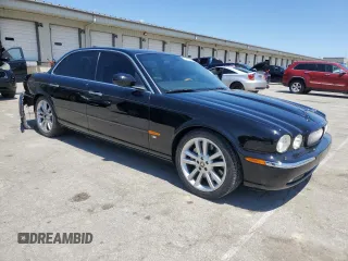 2004 Jaguar XJ с VIN SAJEA73B34TG10749, выставлен на аукционе Copart как лот 56574025 с пробегом 72 240 миль миль и Списание • Salvage title. История ставок и продаж доступна на DreamBid. Изображение 4.