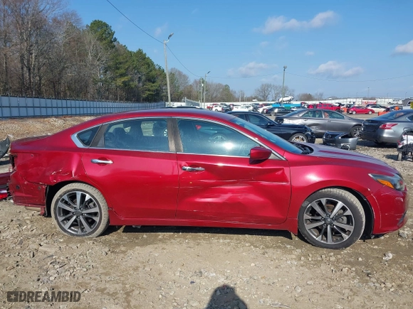 2016 Nissan Altima 2.5 SL with VIN 1N4AL3APXGC281084, listed as a IAAI auction lot 41528669 with 59,201 mi miles. Bid and sale history available at carsss.com. Image 14.