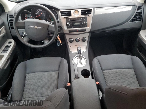 2010 Chrysler Sebring Touring with VIN 1C3CC4FB7AN112467, listed as a Copart auction lot 80875114 with 128,874 mi miles and Salvage Title. Bid and sale history available at carsss.com. Image 8.